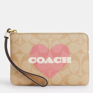 COACH Corner Zip Wristlet With Heart Print